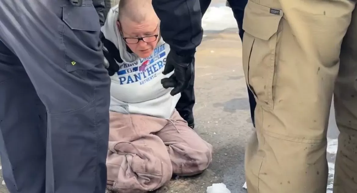 Federal Agents Tackle Bald Female Protestor After She Throws Water Bottle at ICE Agents Outside Federal Building in Minneapolis (VIDEO)